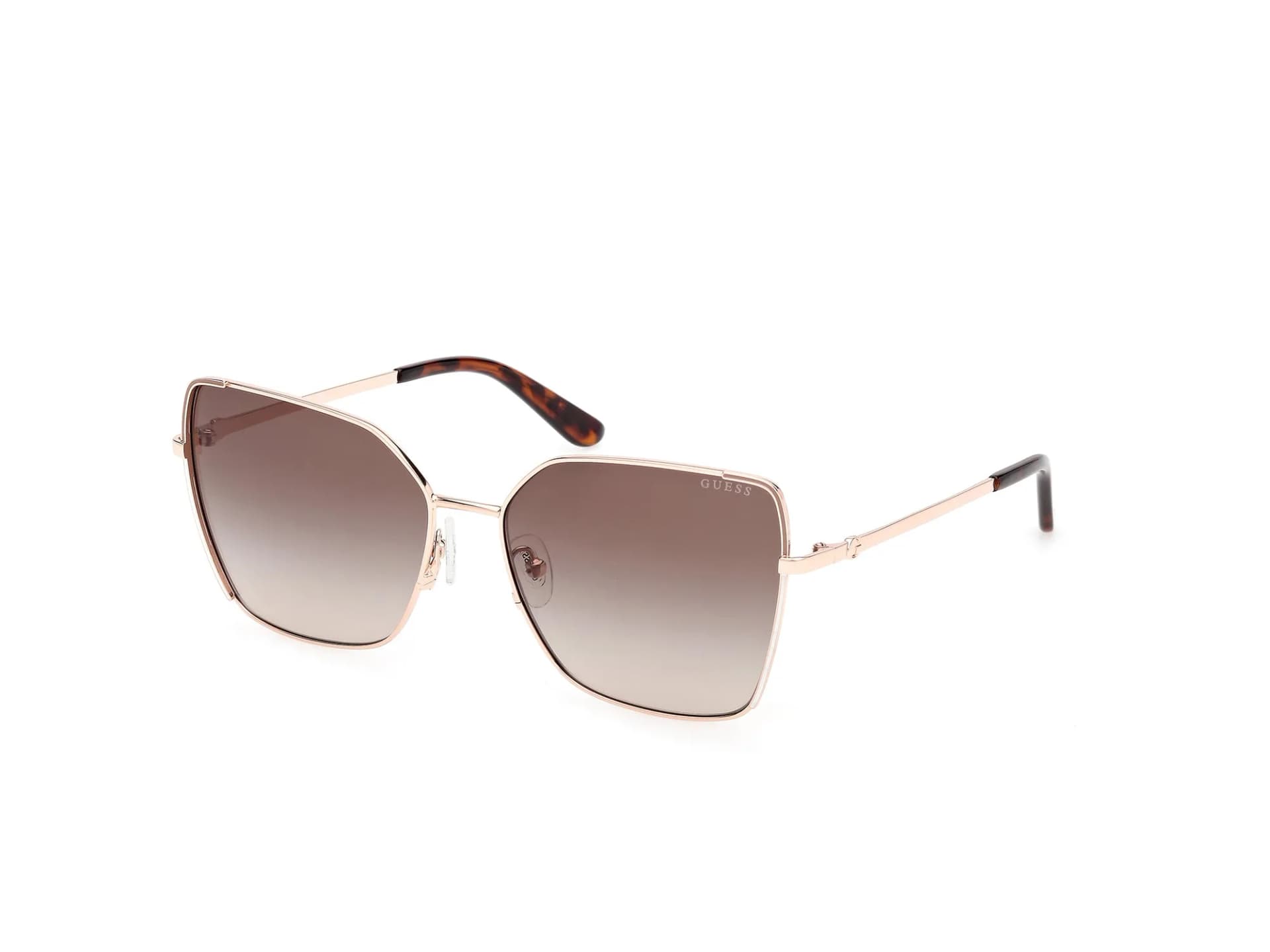 Guess GU00192 sunglasses in Shiny Rose Gold (28F), rose gold metal butterfly frame with brown gradient lenses and havana temple tips, front three-quarter view