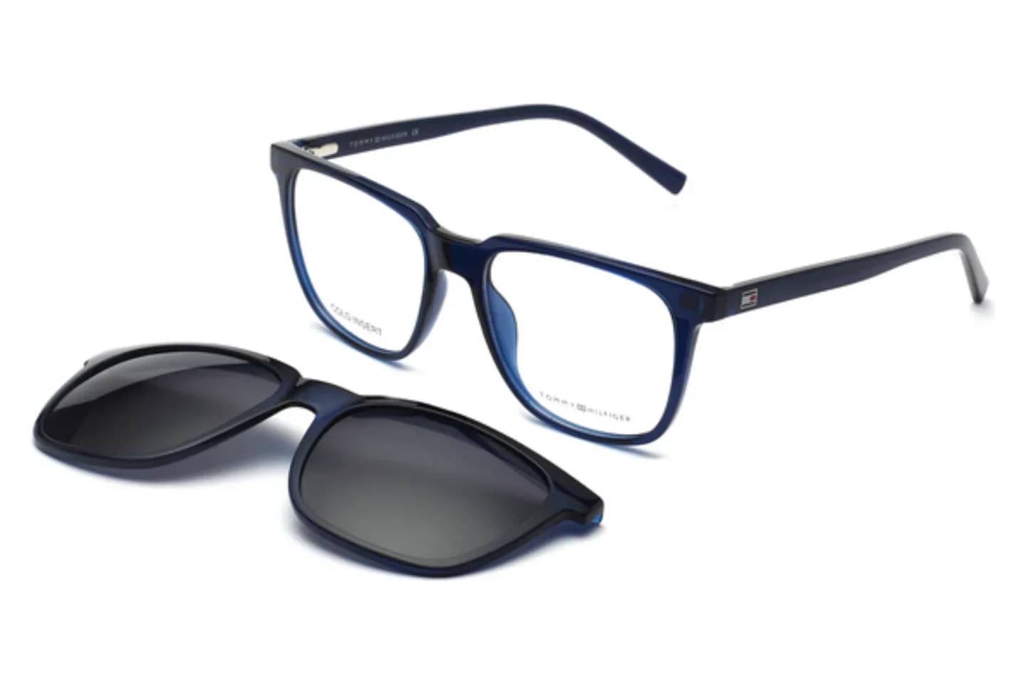 Tommy Hilfiger TH 1080 square acetate frame in C3 transparent navy blue with matching magnetic clip-on sun lens, three-quarter view