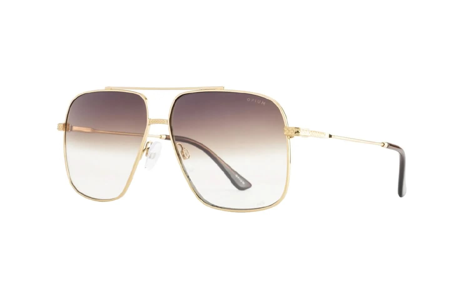 Opium OP-1940 sunglasses in gold with brown gradient lenses, square double-bridge metal frame, front three-quarter view