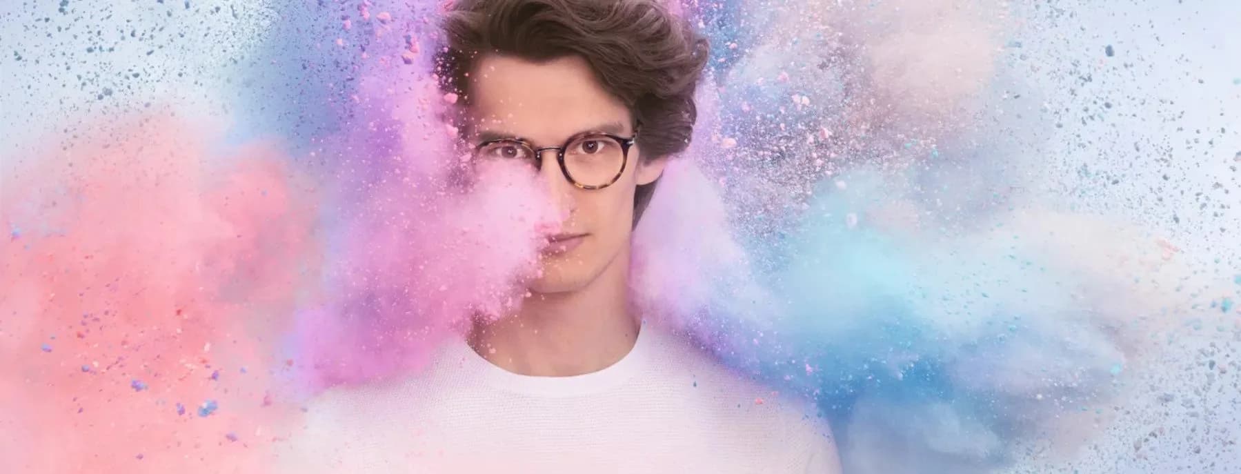 Essilor Crizal FSV Clear Lenses, Essilor Crizal campaign image of a man wearing clear lenses in a pastel colour cloud