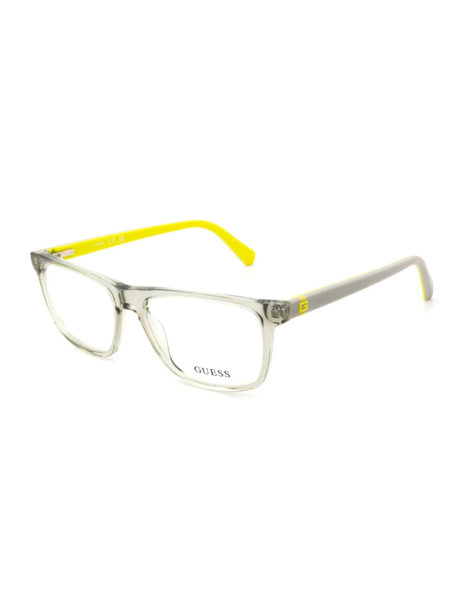 Guess GU50281 020 rectangular eyeglasses, transparent grey front with grey and neon-yellow temples, front three-quarter view