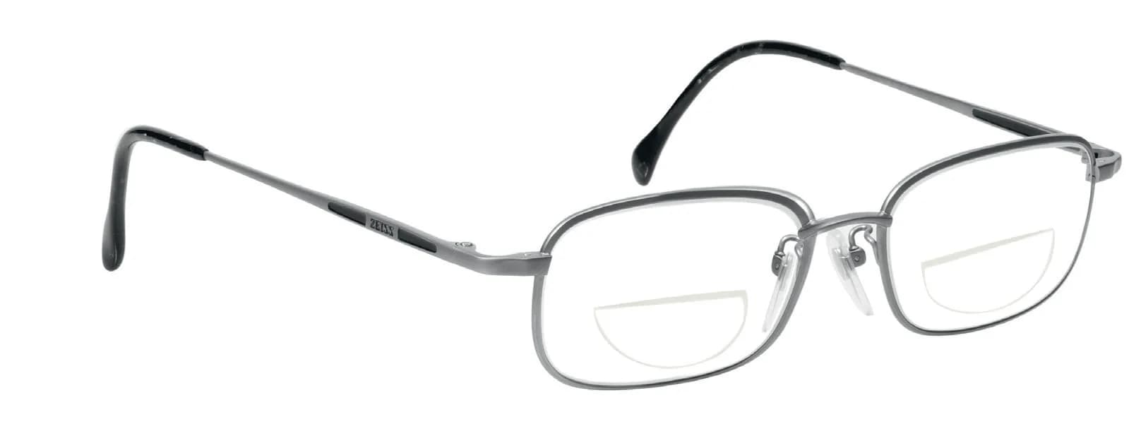 ZEISS Rx Bifocal FT28 Lenses: ZEISS metal frame glazed with FT28 flat-top bifocal lenses (segments visible), Rx BiFocal FT28 benefits panel